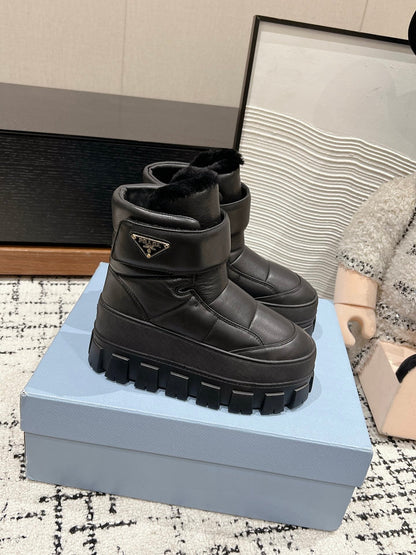 MONOLITH ANKLE BOOTS WITH STRAP IN BLACK CALFSKIN AND FLEECE LINING
