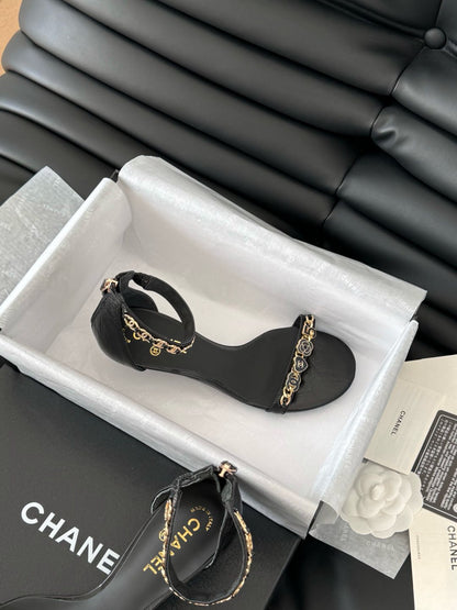 MID-HEEL 35 MM SANDAL IN BLACK SHEEPSKIN WITH STICKERS