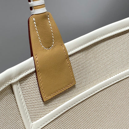 STEEPLE 28 BAG IN OFF-WHITE MIX BROWN CANVAS AND CALFSKIN