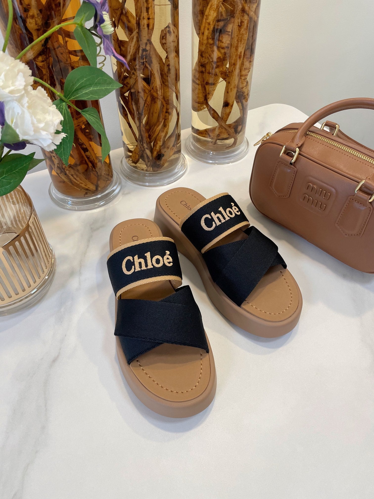 WOODY WEDGE SANDALS IN BLACK CANVAS WITH CIDER BROWN RUBBER SOLE