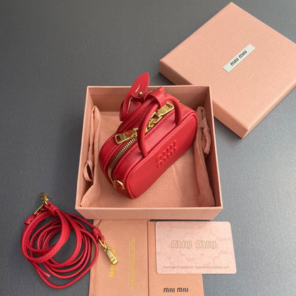 MICRO BAG KEYCHAIN 11 IN TALL POPPY RED CALFSKIN EMBOSSED LOGO