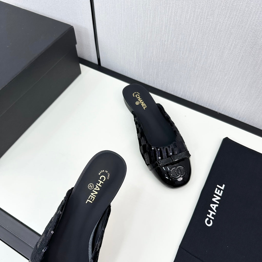 BOW MULE IN BLACK FABRIC AND CALFSKIN