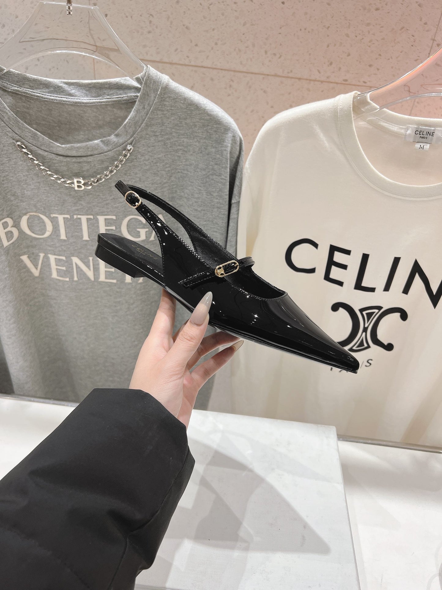 JUDY FLAT SLINGBACK IN BLACK PATENT CALFSKIN