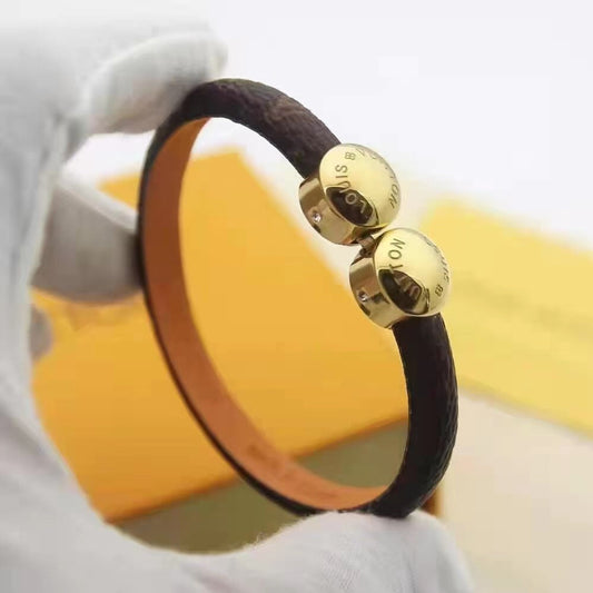 LV LEATHER ROPE 2 MOTIFS GOLD BRACELET