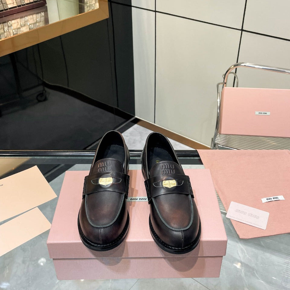 PENNY LOAFERS IN BLACK WITH A RED UNDERTONE CALFSKIN