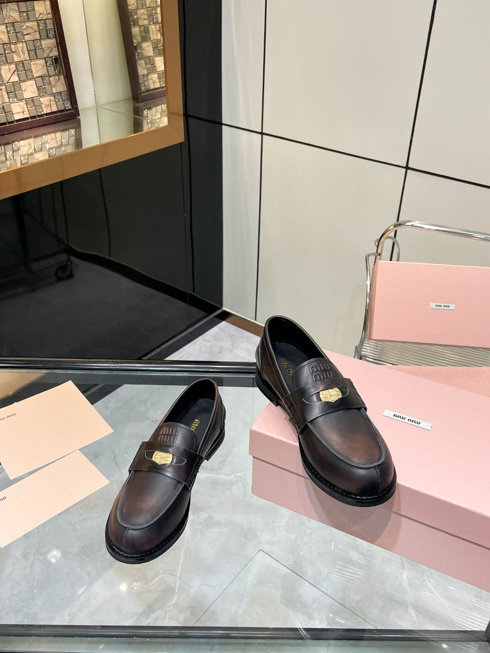 PENNY LOAFERS IN BLACK WITH A RED UNDERTONE CALFSKIN